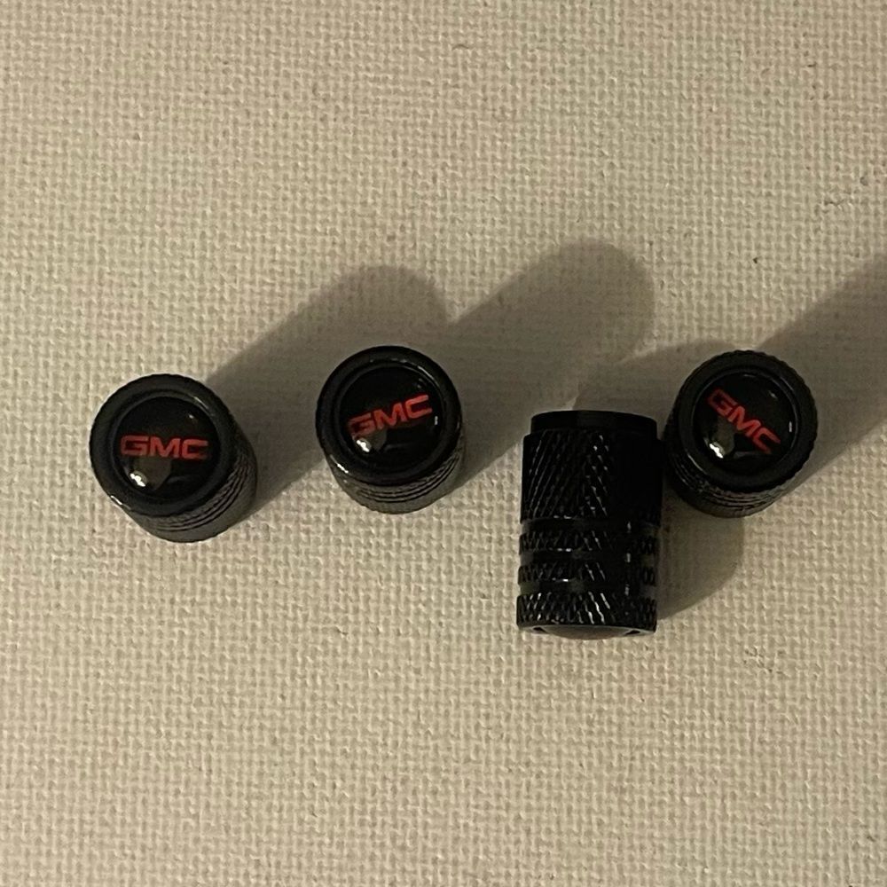 GMC Logo valve Stem caps in Black set of 4 NWT